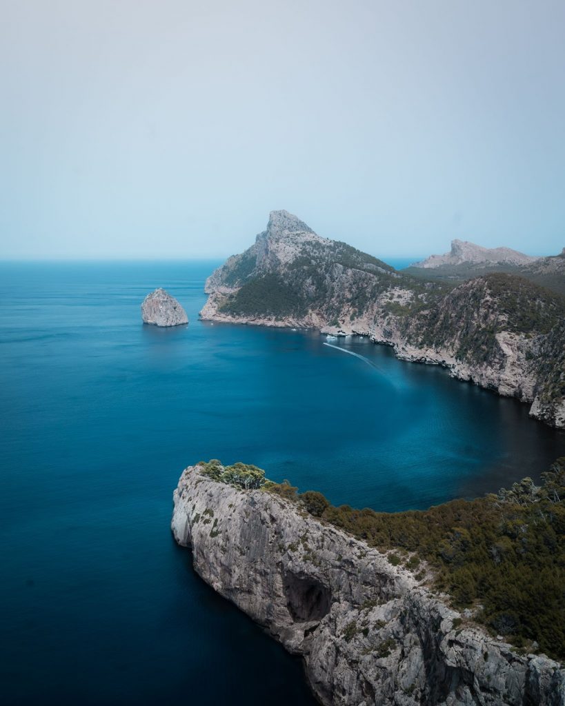 blue sea and cliffs. remote working from spain